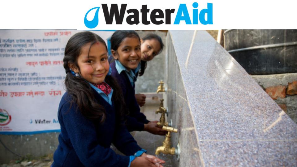 picture of children washing hands in clean water.