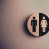 men and women restroom signs.