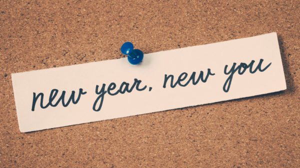 paper saying new year, new you.