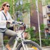 millennial riding a bike, being eco-friendly