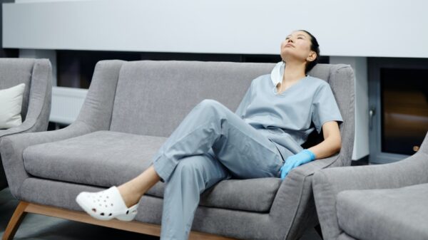 nurse relaxing on a couch.