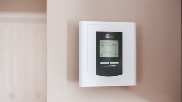 White thermostat on the wall.