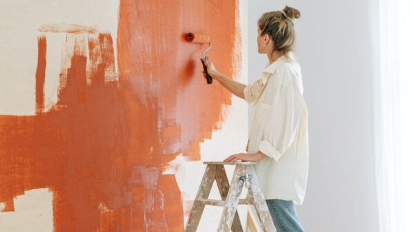 woman painting a room.