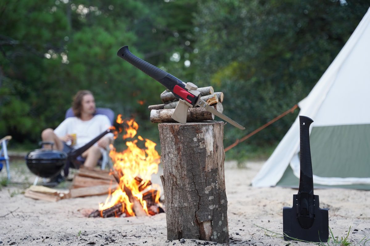 multitool on a stump at a campfire.
