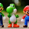 Figurines of Luigi, Yoshi, and Mario.