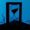 A silhouetted hourglass.
