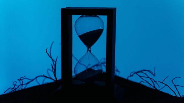 A silhouetted hourglass.