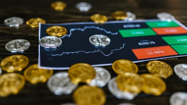 Crypto coins on a printed graph.
