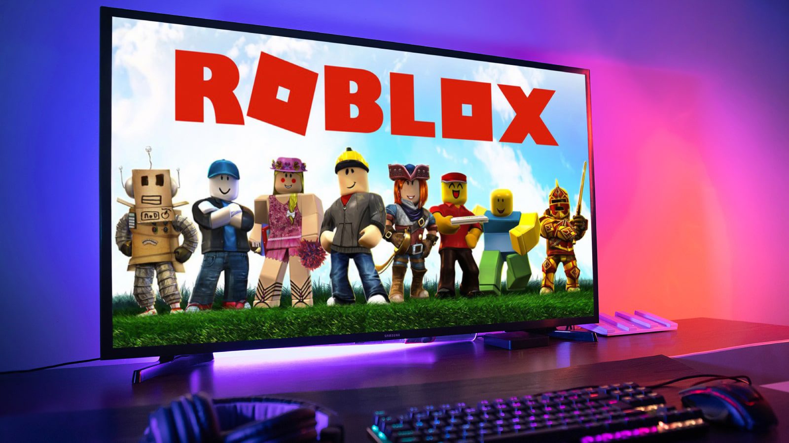 The Roblox loading screen on a monitor.