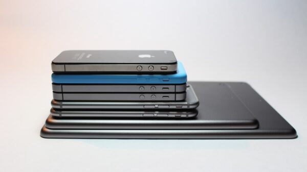 A stack of different Apple devices.