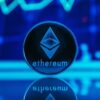 An ether coin in blue light.