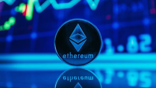 An ether coin in blue light.