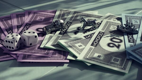 Monopoly money and game pieces.