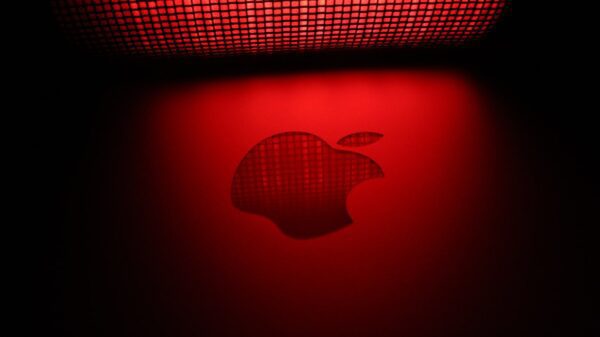 A red light on an Apple logo.