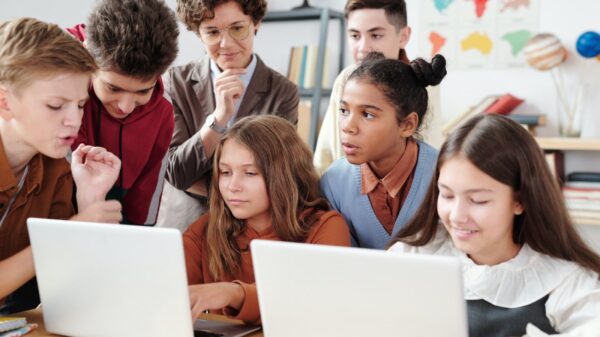 Students using laptops.